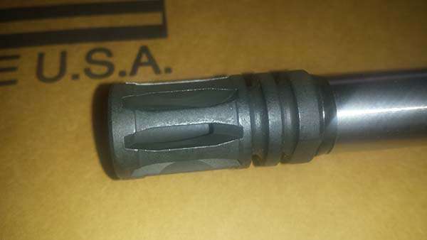 difference between an ar 15 compensator vs muzzle brake